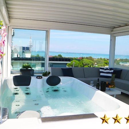 Hotel Rossini 4S Lignano Sabbiadoro Bagian luar foto