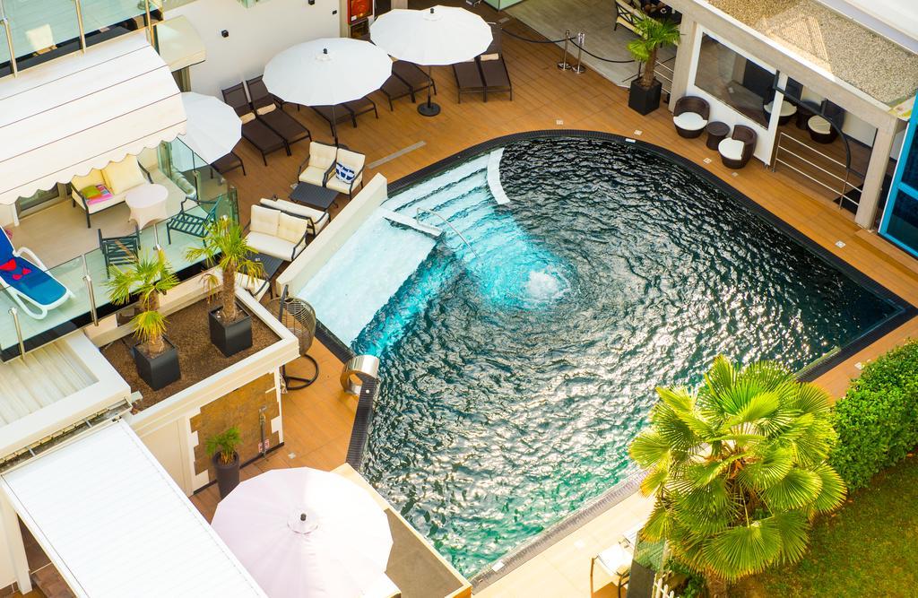 Hotel Rossini 4S Lignano Sabbiadoro Bagian luar foto