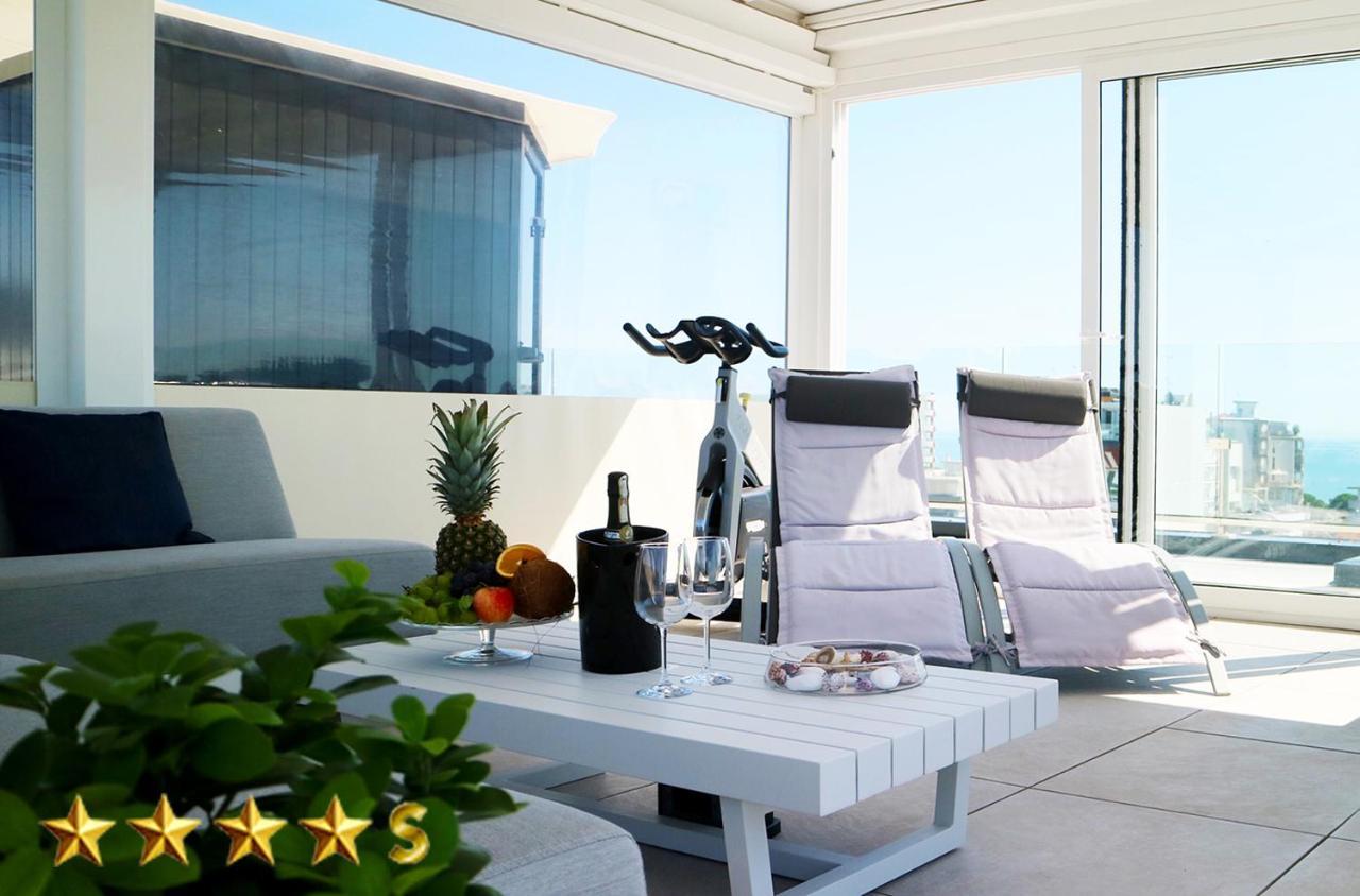 Hotel Rossini 4S Lignano Sabbiadoro Bagian luar foto